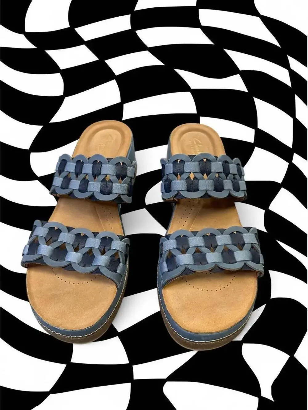 Clark’s blue leather sandals with woven strap detail